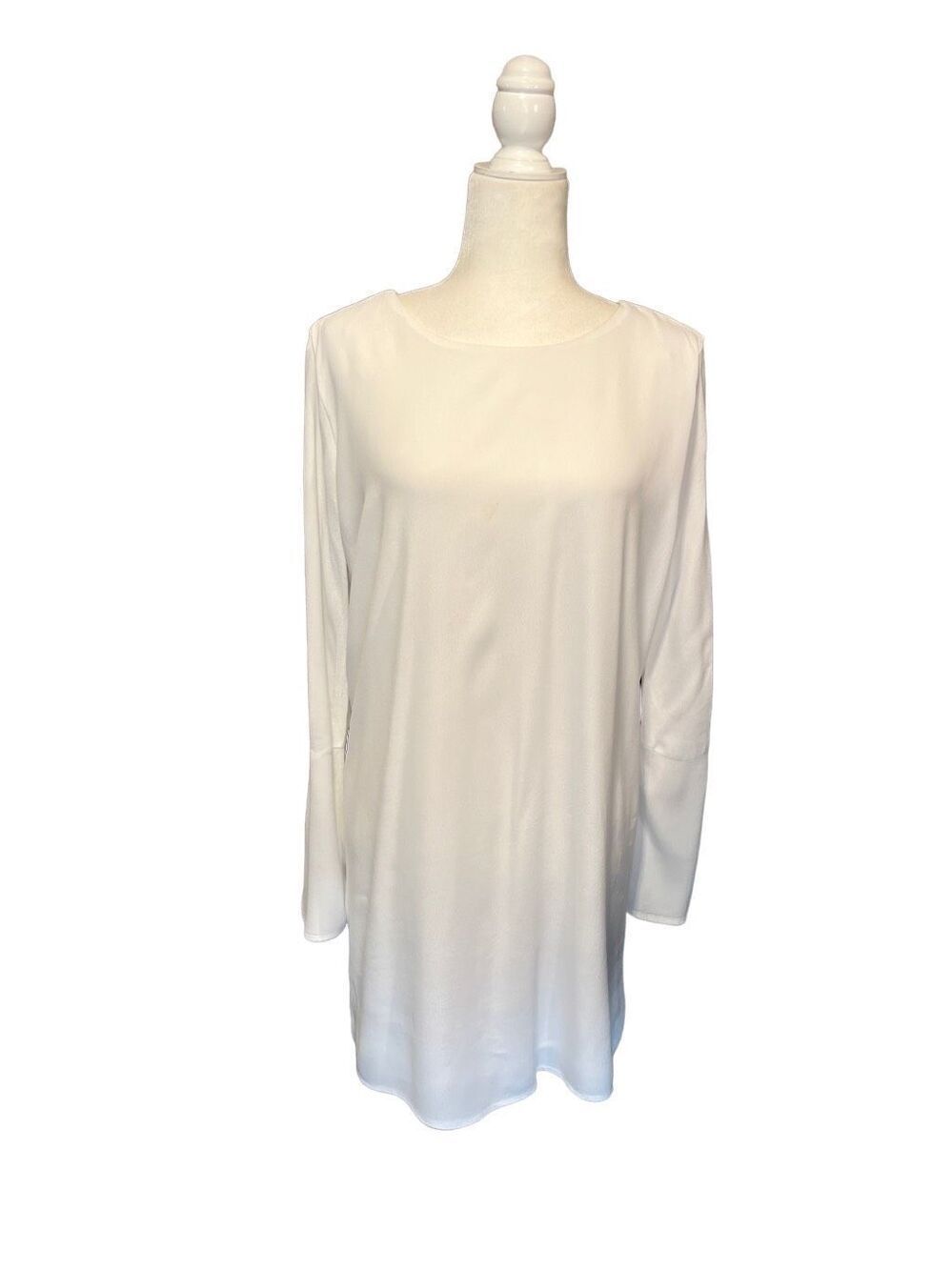 Lulu’s white long sleeve sheath dress with tied scoop back and flared sleeves -